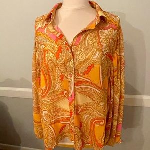 Paisley patterned blouse.